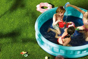 Artificial grass swimming pool